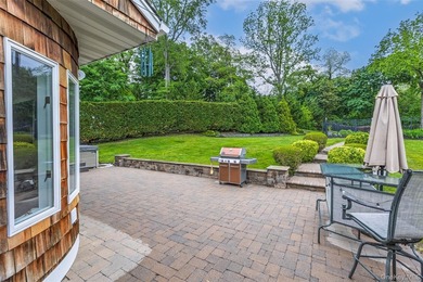 Tucked away on a lush, private three-quarter acre in the highly - photo 38