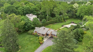 Tucked away on a lush, private three-quarter acre in the highly - photo 43