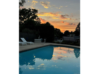 Tucked away on a lush, private three-quarter acre in the highly - photo 45