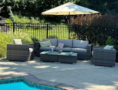 Tucked away on a lush, private three-quarter acre in the highly - photo 46