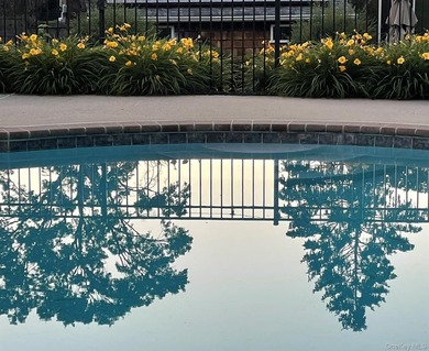 Tucked away on a lush, private three-quarter acre in the highly - photo 47
