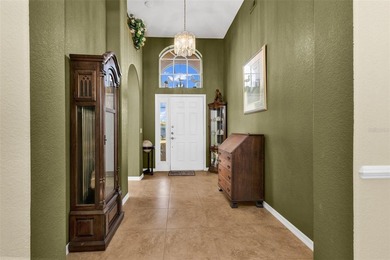 RARELY AVAILABLE FULL 3-CAR GARAGE with a circular driveway with - photo 3