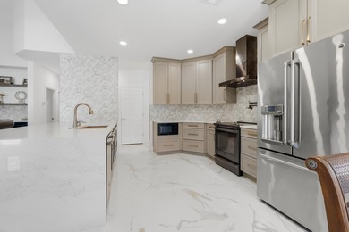 Welcome to this beautifully updated 5BR/3.5BA waterfront home in - photo 9