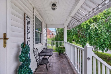 Welcome Home! This charming 1.5-story bungalow is situated on a - photo 5