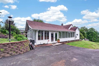Welcome Home! This charming 1.5-story bungalow is situated on a - photo 8