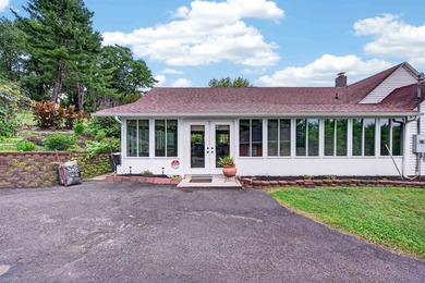 Welcome Home! This charming 1.5-story bungalow is situated on a - photo 9