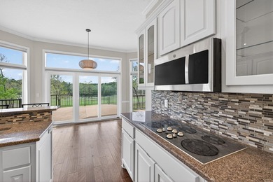 With stunning views of holes #3 and #4 along with a pond and - photo 38