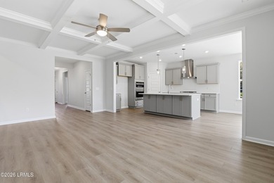 The single-story Bates II plan features three bedrooms and two - photo 11