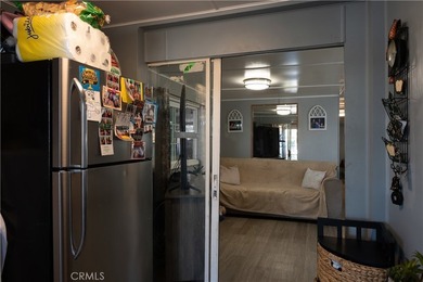 Ready to move in! This affordable, low land lease mobile home in - photo 11