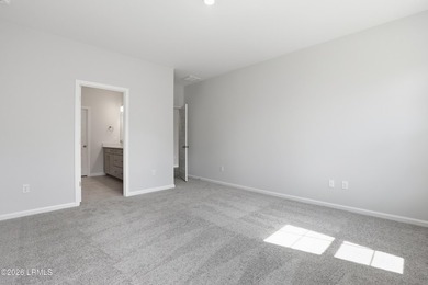 The single-story Bates II plan features three bedrooms and two - photo 14