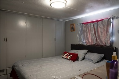 Ready to move in! This affordable, low land lease mobile home in - photo 16