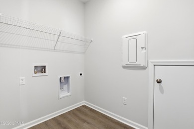 The single-story Bates II plan features three bedrooms and two - photo 19