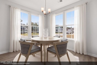 The single-story Bates II plan features three bedrooms and two - photo 23