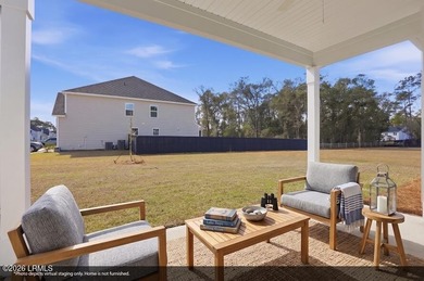 The single-story Bates II plan features three bedrooms and two - photo 29