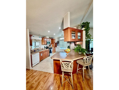 Welcome to this charming 3-bedroom, 2-bathroom home in the - photo 2
