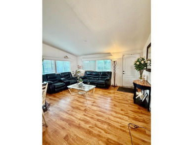 Welcome to this charming 3-bedroom, 2-bathroom home in the - photo 3
