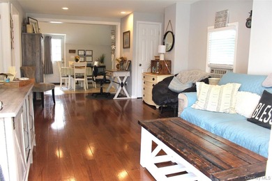 This Charming Home Features A Living Room With Beautiful - photo 3