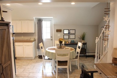 This Charming Home Features A Living Room With Beautiful - photo 8
