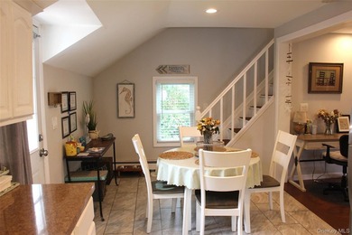 This Charming Home Features A Living Room With Beautiful - photo 9