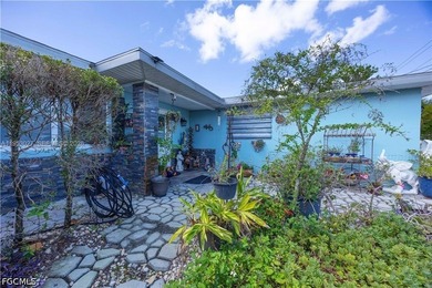 This charming ranch-style home in Cape Coral, Florida, offers - photo 3