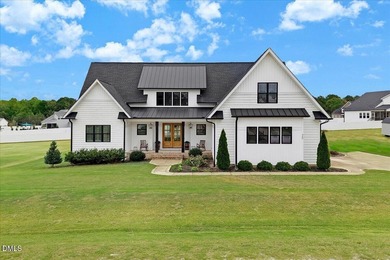 (private lake, pond, coastal) Home Sale Pending in Four Oaks North Carolina