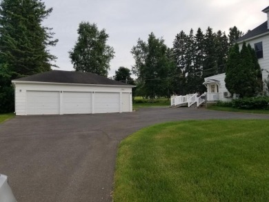 Lots of space inside and outside on this one.  Large corner lot