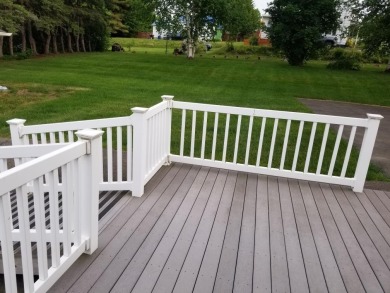 Lots of space inside and outside on this one.  Large corner lot