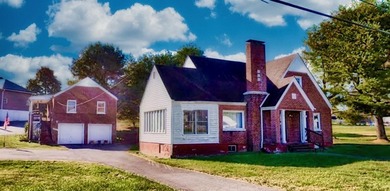 Don't let the front view fool you-this property offers much more - photo 1