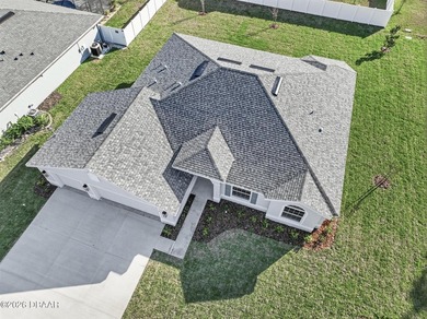 Enjoy spacious living with 10-foot ceilings and a bright, open - photo 2