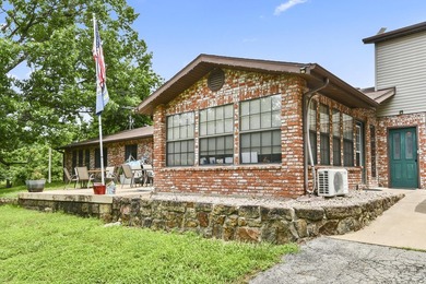 Discover the charm of Ozark living in this unique berm home just - photo 4
