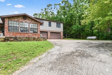 Discover the charm of Ozark living in this unique berm home just - photo 5