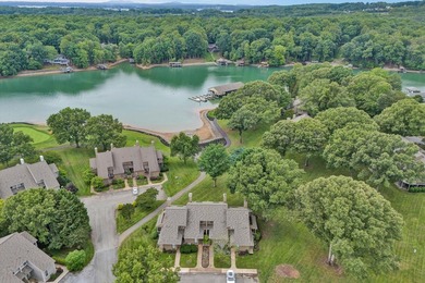 Experience carefree lake living in this beautifully maintained - photo 1