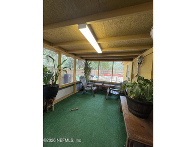 Cute 3 Bedrooms 2 Baths Brick and Concrete Block Home, screened - photo 12