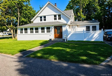 This charming corner-lot Colonial features 4 bedrooms, including