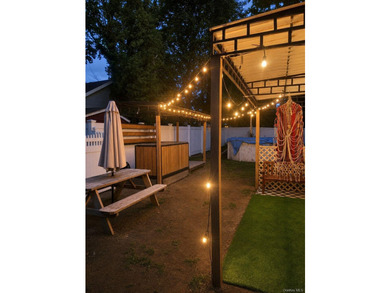 This charming corner-lot Colonial features 4 bedrooms, including - photo 9
