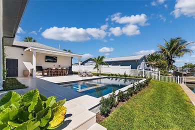 Located in the highly desirable waterfront community of - photo 3