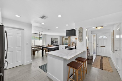 Located in the highly desirable waterfront community of - photo 6
