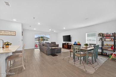 The open-concept floor plan is perfect for entertaining and - photo 10