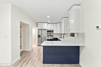 Walk to park, River, Schools! Beautifully updated 4 bdrm 3 ba - photo 11