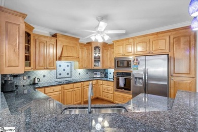 scover this stately brick home situated on the fifth hole in - photo 12