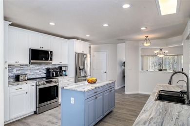 Contemporary style defines this recently remodeled 3 bedroom, 3 - photo 7