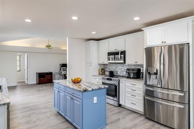 Contemporary style defines this recently remodeled 3 bedroom, 3 - photo 9