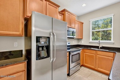 Move-in ready and impeccably maintained, this beautiful townhome - photo 9
