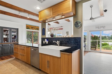 Perfectly sited on a protected inlet on West Lake, with direct - photo 11