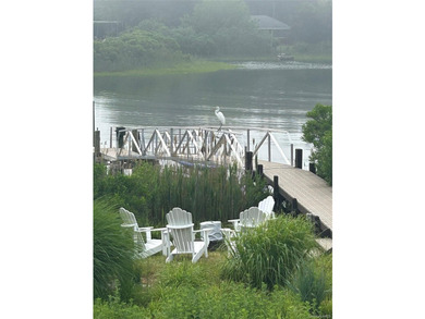 Perfectly sited on a protected inlet on West Lake, with direct - photo 35