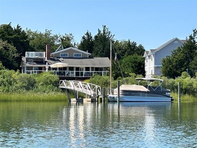 Perfectly sited on a protected inlet on West Lake, with direct - photo 38