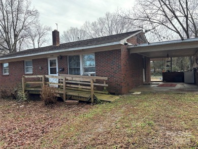 Solid opportunity in a desirable location! This full brick