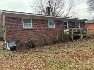 Solid opportunity in a desirable location! This full brick