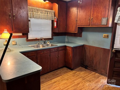 Solid opportunity in a desirable location! This full brick