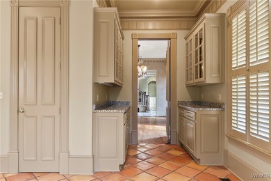 This stunning home is located North of the River in the very